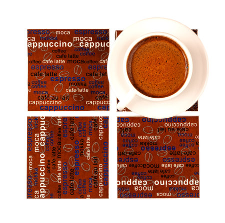 coasters for coffee with inscriptions and a cup of coffee on a white backgroundの写真素材