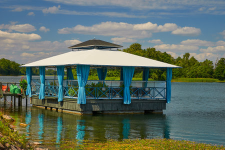 summer gazebo on the waterの写真素材