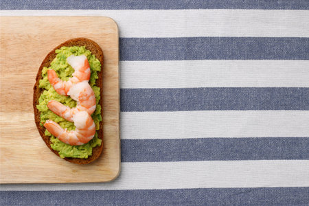 sandwich with shrimp and avocado on light backgroundの写真素材