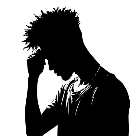 A minimalist black and white vector silhouette of a man's side profile.のイラスト素材