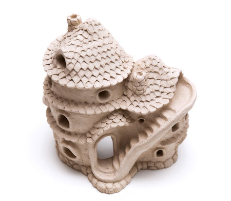 Doll house made of clay. Ceramic fairy tale toy.の写真素材