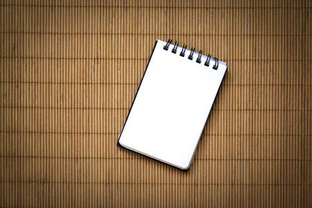 Bamboo sticks texture abstract background with blank circular notepad in east chinese style