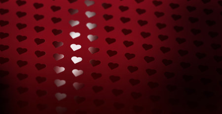 A heart pattern of spot uv varnish print on red note paper background.の写真素材