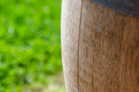 Wine: detail of a wooden barrel, precious woods are always used to age wine