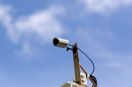 Security Video Surveillance: The security camera monitors areas, useful for monitoring cities, streets and private properties. Anti-theft and security technological tool.の写真素材
