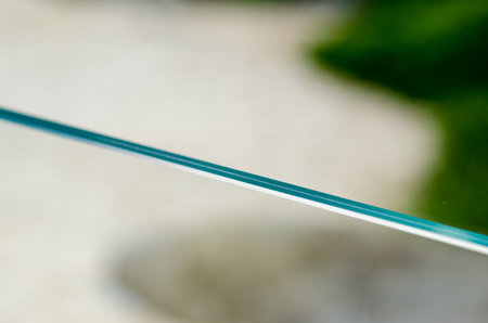 House: detail of the glass, clear and clean double glass, the shockproof double crystal protects against falling. Used as a balustrade or parapet for modern buildings with contemporary architecture.の写真素材