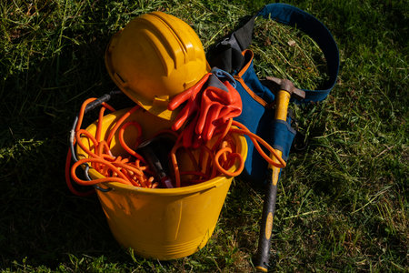 work on construction sites, individual protection of helmet, hammer and gloves symbol of work, carpenters and construction sites workers. superbonusの写真素材