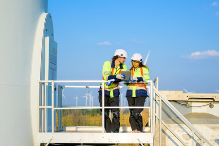 Renewable energy engineer working on wind turbine