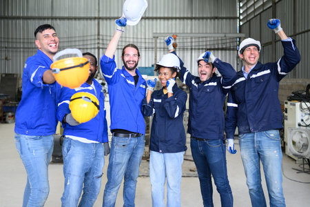 Group of successful worker at factory