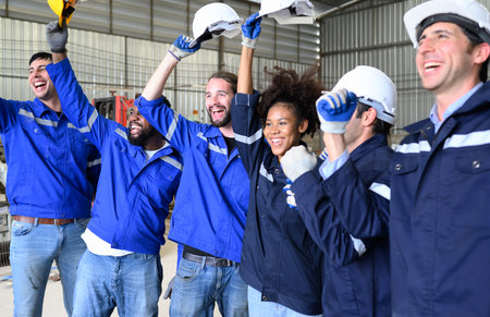 Group of successful worker at factory