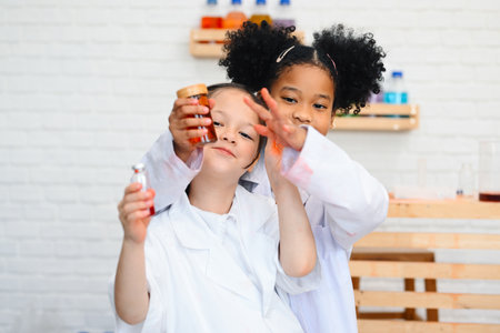 Child in classroom at school, Kid dressed Science lab coat. Science conceptの写真素材
