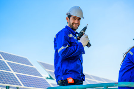 Solar panel station, Engineer installing solar panel at solar energy farm field