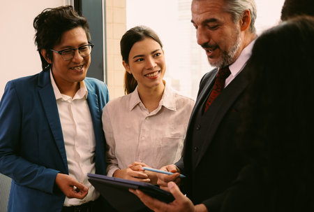 Close up of business officer teamwork brainstorming and talkingの写真素材