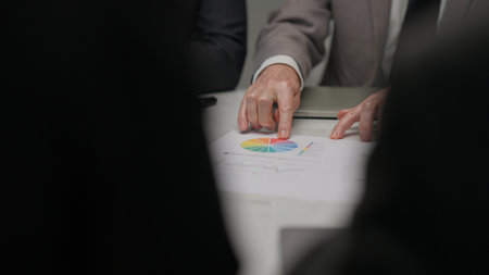 Close up of business officer teamwork brainstorming and talking in meeting roomの写真素材