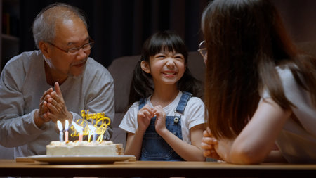 Family celebrating birthday with happiness