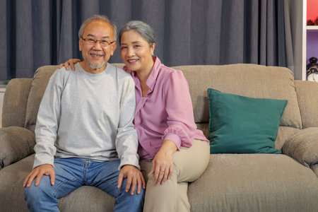 Portrait Senior couple smile to camera, front viewの写真素材