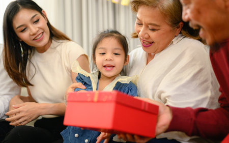 Happy and cheerful family spending good time together at home