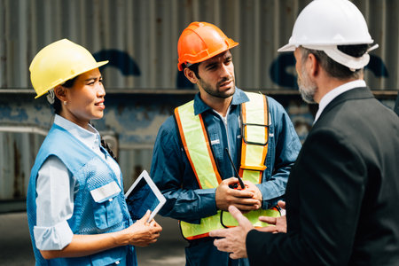 Warehouse engineer worker working at industrial container yardの写真素材