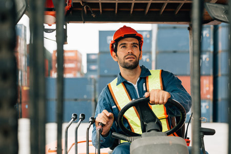 Warehouse engineer worker working at industrial container yardの写真素材