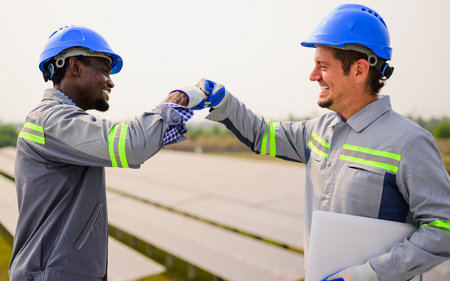 Maintenance technician working on ecological solar cell farm
