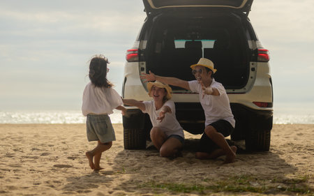 Happy family having fun on beach, Family travel on summer vacationの写真素材