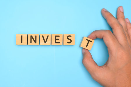 Investment text on blue background, Investment strategy and benefitsの写真素材