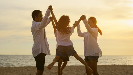 Happy family spending vacation time together on beach, Family with beach travelの写真素材