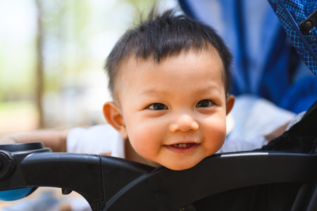 Portrait of cute son baby travel with family on holiday weekendの写真素材