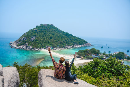 couple travel. view point of Nangyuan island in thailand popular tourist destinationsの写真素材