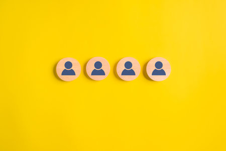 Wooden block with teamwork employees business iconsの写真素材