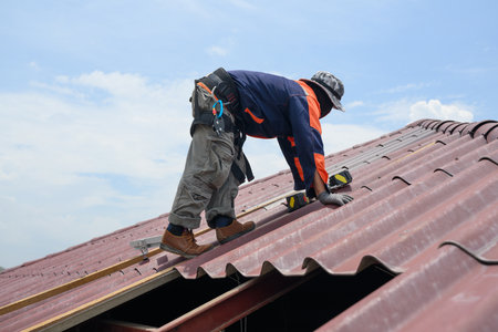 Professional engineer worker installing solar panels system on rooftop
