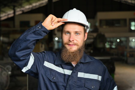 Mechanical engineer repairing engine machine at factoryの写真素材