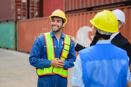 Warehouse engineer worker working at industrial container yardの写真素材