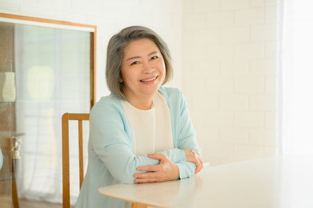 senior portrait. cheerful senior smiling portrait. mature woman looking camera.の写真素材