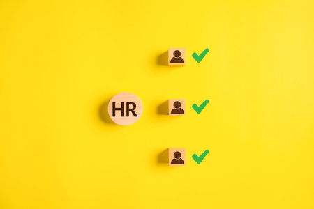 Wooden blocks with people icon for hiring and selectionの写真素材