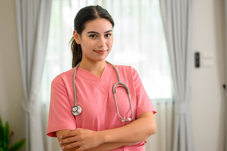 Smiling portrait of professional female doctor with stethoscopeの写真素材