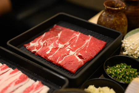 Slide beef in black plate, Slide of beef, Beef and hotpotの写真素材