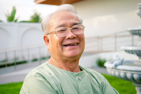 Group of senior people sitting on sofa having activities together at nursing home, Doctor and nurse assisting elderly people at retirement home, Health care at hospital or nursing homeの写真素材