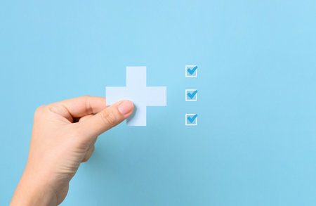 Hand holding plus icon for medical and health care concept, Access to welfare health, People with health care, Health insurance, Family life insurance, Medical care insuranceの写真素材