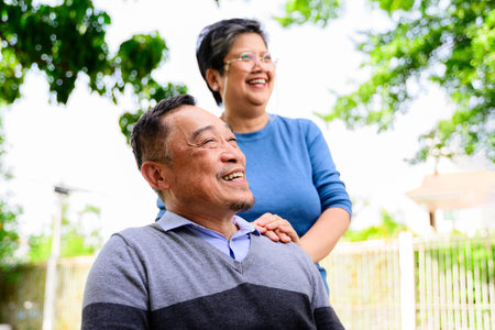 Portrait of healthy senior man and woman enjoying at home, Happy senior married couple spending time together, Grandparents relaxing at home, Happy family with good relationshipの写真素材