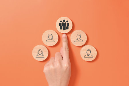 Wooden block with teamwork employees business iconsの写真素材
