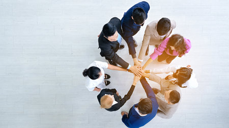 Professional group of business team stacking hands together with teamwork, Business people meeting...