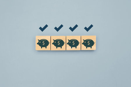 financial icon on wooden block. financial symbol on wooden with clean background. High quality photoの写真素材