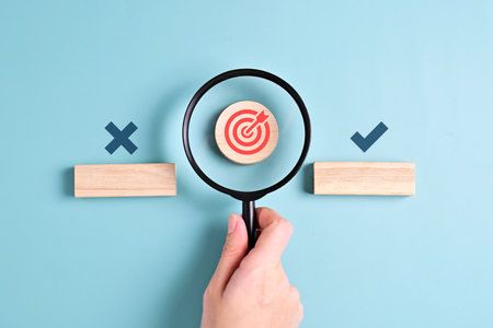 Target icon. Goal symbol. Arrow hit the middle point of dartboard. hight quality photoの写真素材