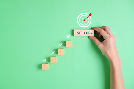 success target background. step of success target to the arrow board. arrow hit on middle board . target and success symbol. High quality photoの写真素材