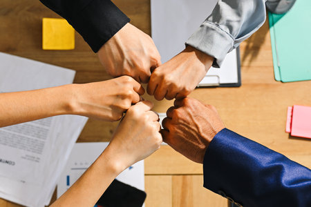 Professional group of business team stacking hands together with teamwork, Business people meeting...