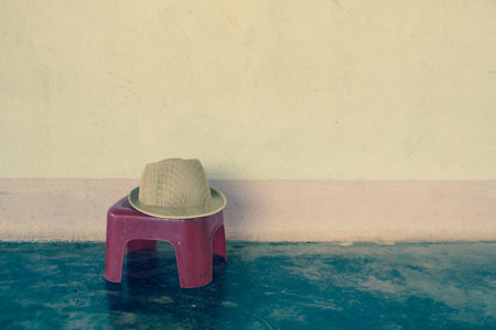 Cap set on a background of the old wallの写真素材