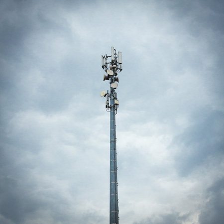 Telecommunications Antenna Tower For Radio, Television And Telephony With cloud skyの写真素材