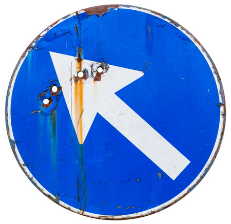 Old Direction Sign. Shot out with bullet holesの写真素材