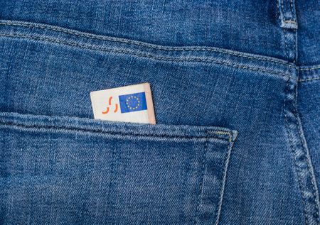 Money in jeans back pocketの写真素材